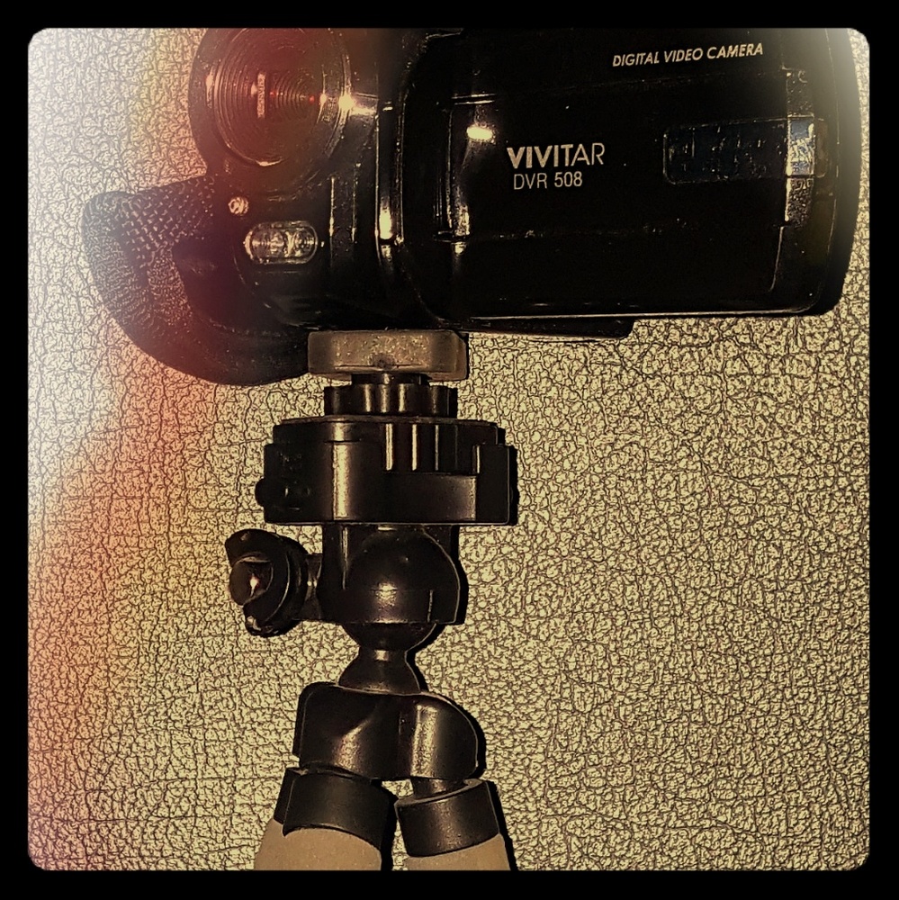 Vivitar camera , tripod and light